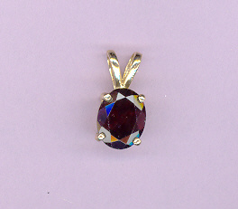 14kt Gold w/ 2.1ct  9x7mm MOZAMBIQUE GARNET